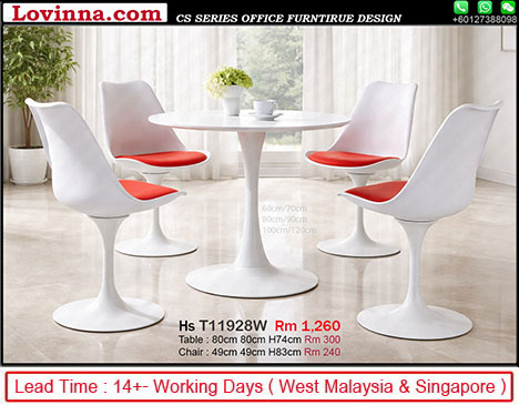 round meeting table with comfortable fabric chairs